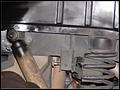 RE8003 Bolt showing from right rear track bar bolt unibody bracket.