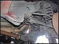 RE8003 Showing left rear lower control arm removed.