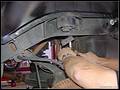 RE8003 Removing rear bump stop cup.