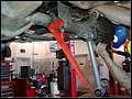 RE8003 Removing front shocks.