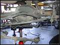 RE8003 Disconnecting unibody side front track bar.