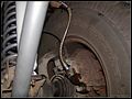 RE8003 Showing braded brake line installed.